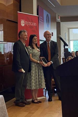 Member of the REHAB Lab receiving her award